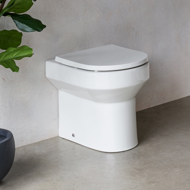 Britton Bathrooms Shoreditch Round Rimless Back to Wall Toilet & Seat - 500mm Projection
